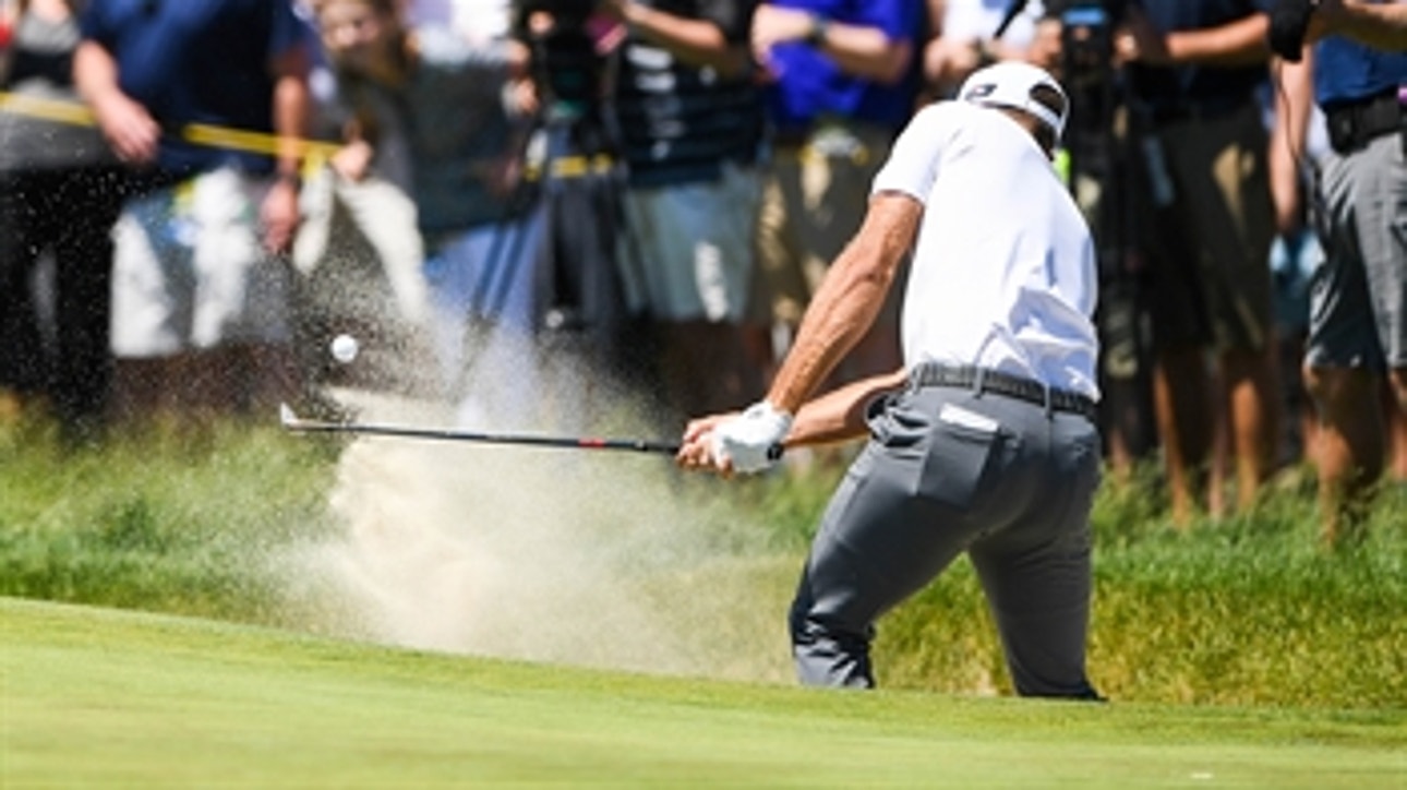 Dustin Johnson chips in from the bunker to birdie the 8th hole