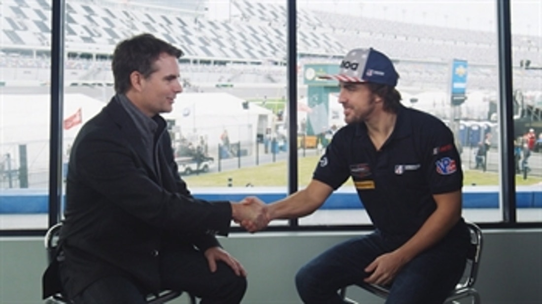 Fernando Alonso talks with Jeff Gordon about his first start in the Rolex 24 at Daytona