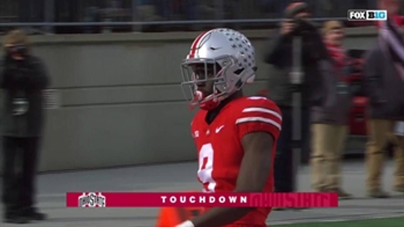 Buckeyes rolling as J.T. Barrett heaves a 48-yard TD pass to Binjimen Victor, Ohio State up 42-3