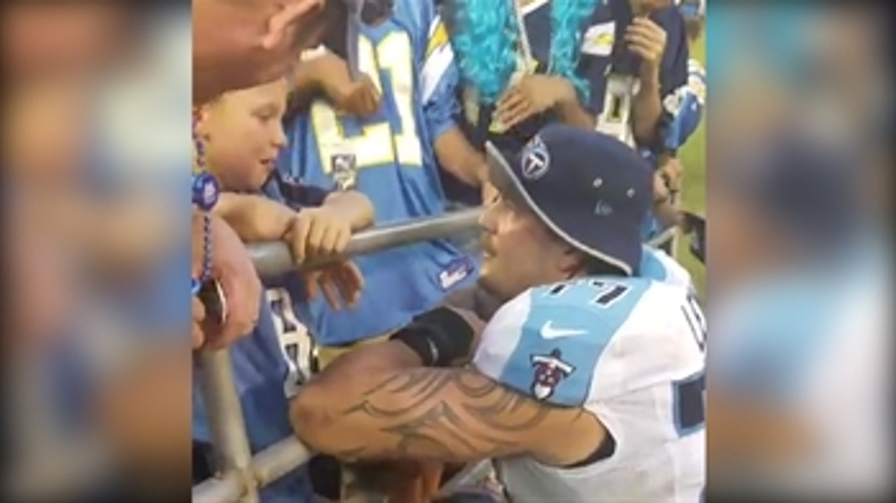 Titans player comforts crying fan