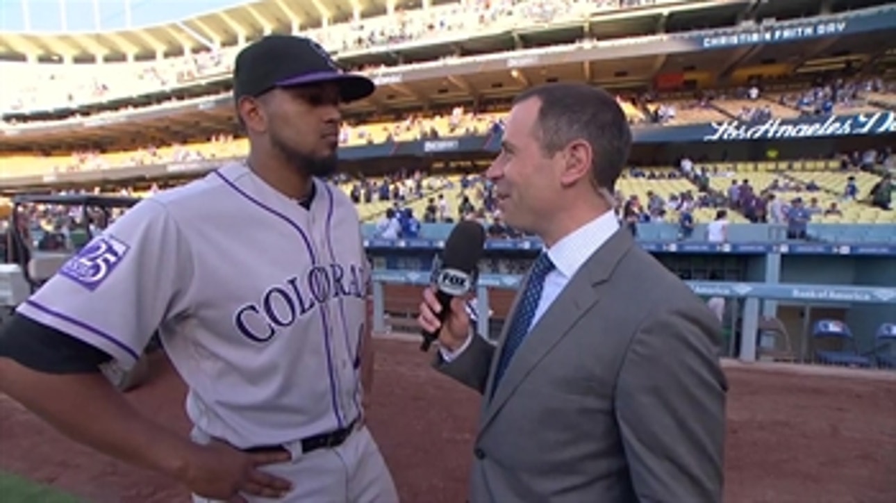 JP Morosi talks with German Marquez after pitching a Gem against the Los Angeles Dodgers