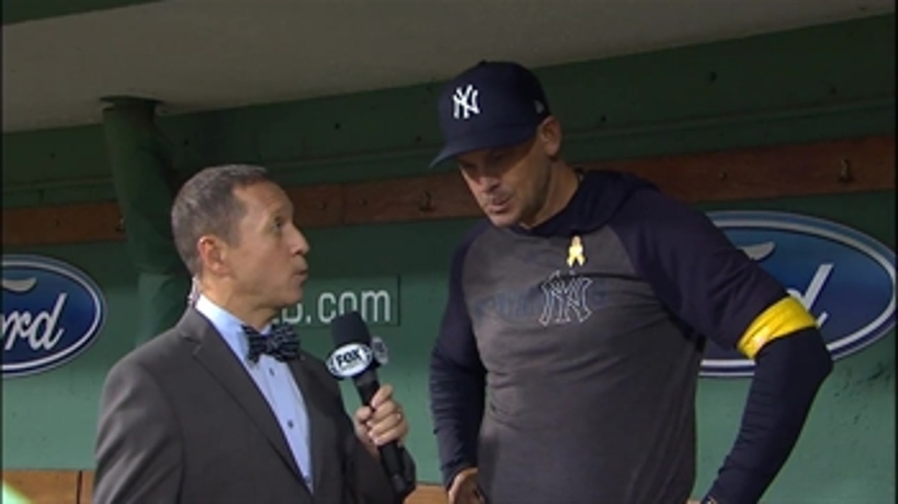 Ken Rosenthal talks with Yankees manager Aaron Boone following a win over Boston