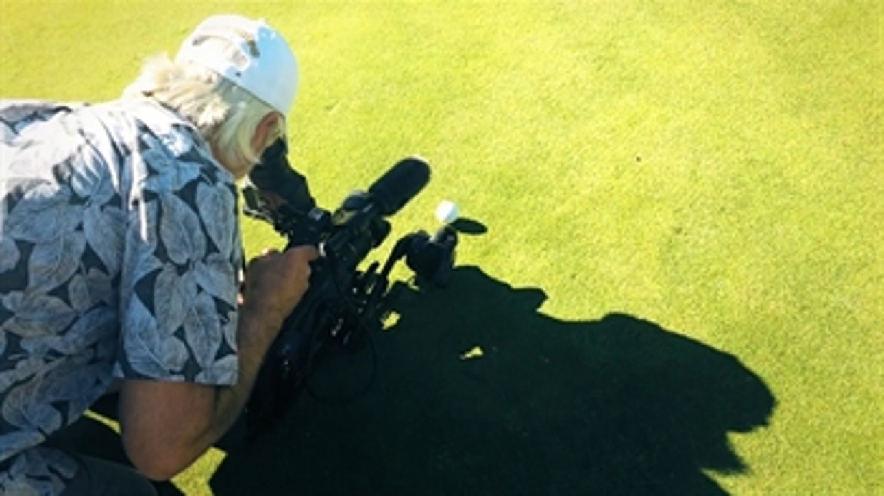 Dustin Johnson shows just how accurate he is by almost hitting cameraman