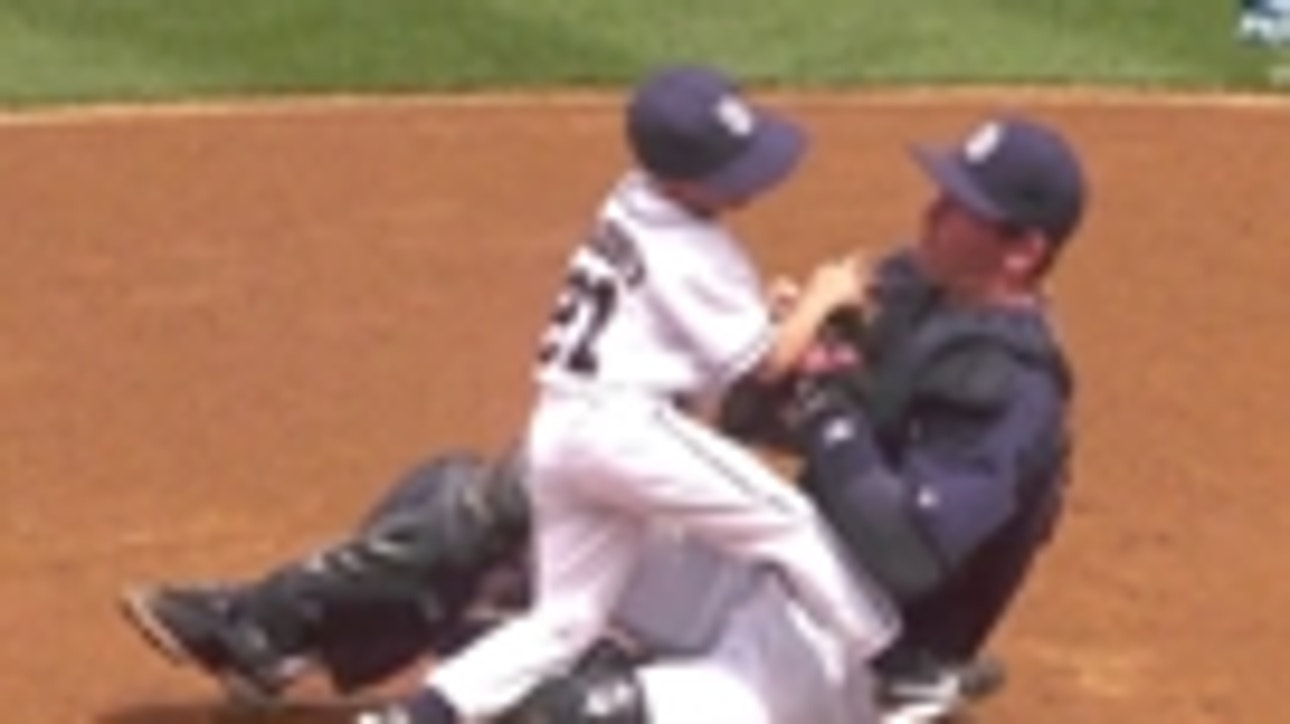 Kid knocks over catcher blocking the plate