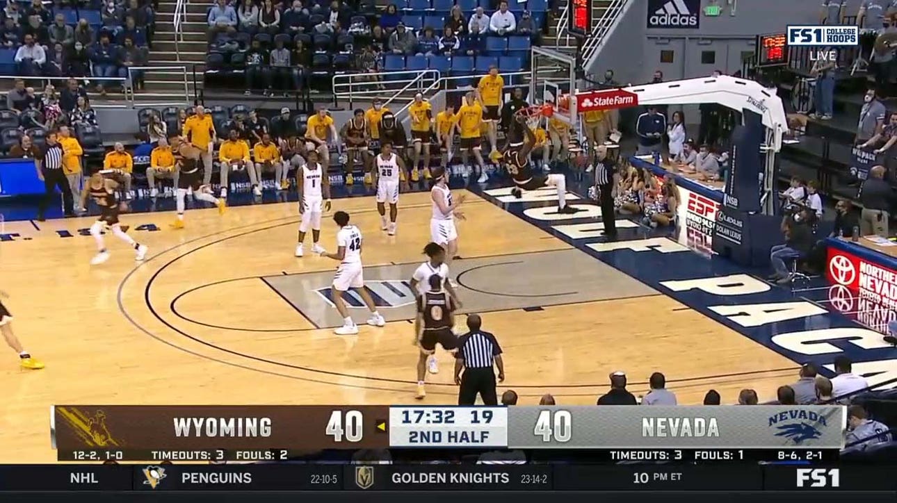 Graham Ike's two-handed slam gives Wyoming the lead over Nevada