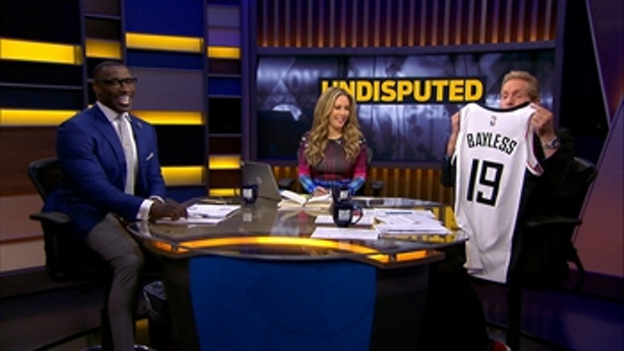 Skip Bayless shows off the custom jersey gifted to him by the Los Angeles Clippers