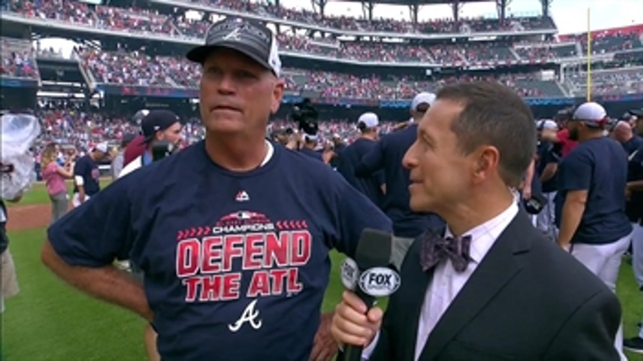 Watch the Atlanta Braves' manager get choked up after clinching the NL East division