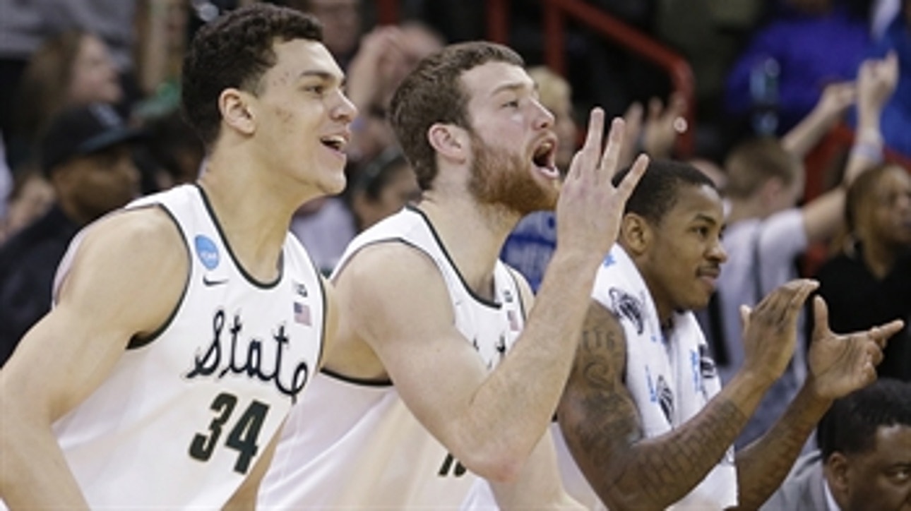 Michigan State holds off Harvard to advance