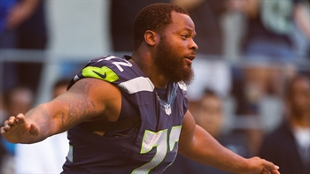 Marshawn Lynch, Michael Bennett sit on bench for national anthem - Shannon responds