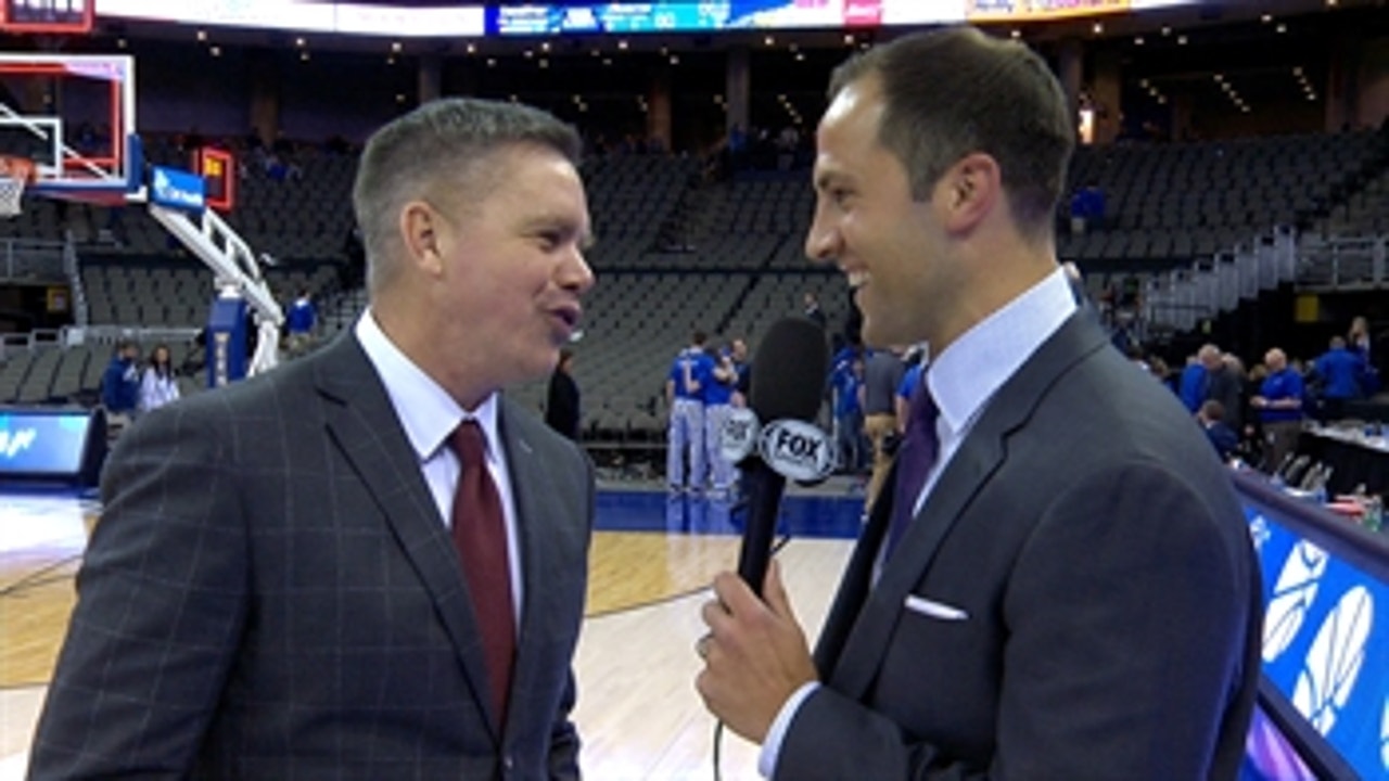 Chris Holtmann talks with Nick Bahe after Ohio State's comeback win over Creighton