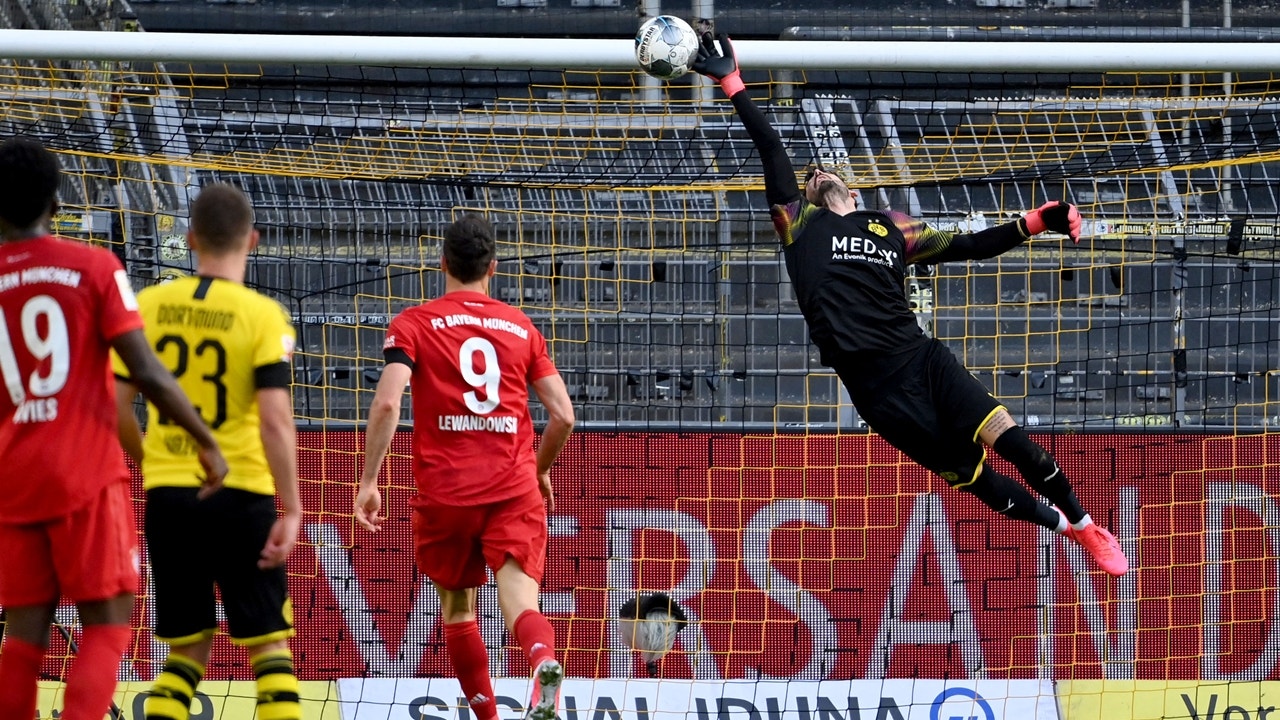 Roman Bürki keeps Dortmund in striking distance of Bayern with a pair of incredible saves