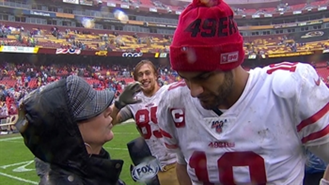 George Kittle photobombs Jimmy Garoppolo after 49ers' win: 'Hi, Mom!'