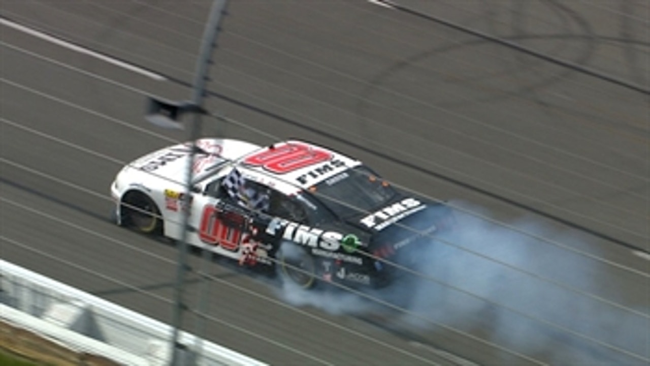 Cole Custer passes Tyler Reddick on the last turn to win at Pocono