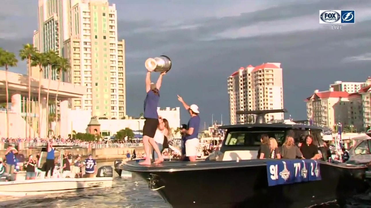 Victor Hedman hoists Stanley Cup during Lightning's boat parade
