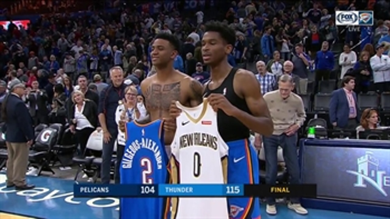 Cousins Exchanging Jerseys after Thunder Win over the Pelicans
