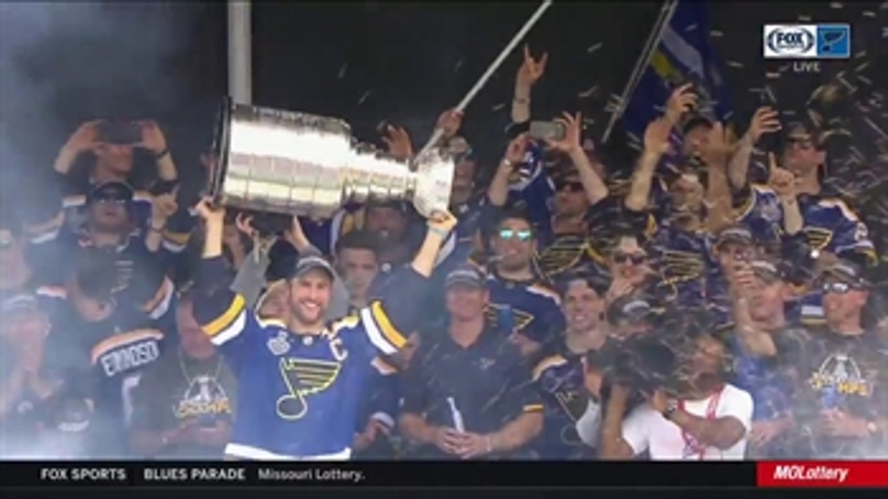 Blues players take the stage for championship rally