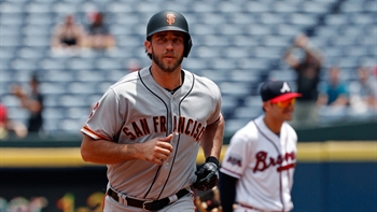 Bumgarner homers, strikes out 11 in Giants' 6-0 win over the Braves