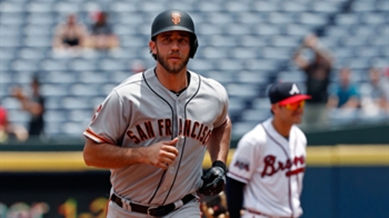 Bumgarner homers, strikes out 11 in Giants' 6-0 win over the Braves