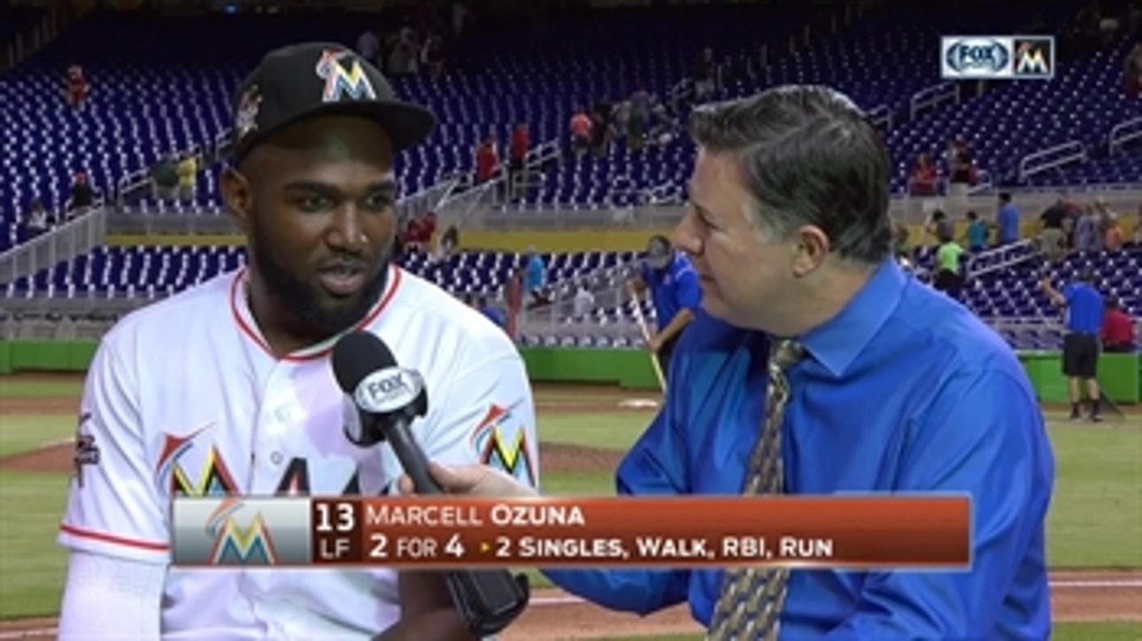 Marcell Ozuna speaks with Craig Minervini after his walk-off single