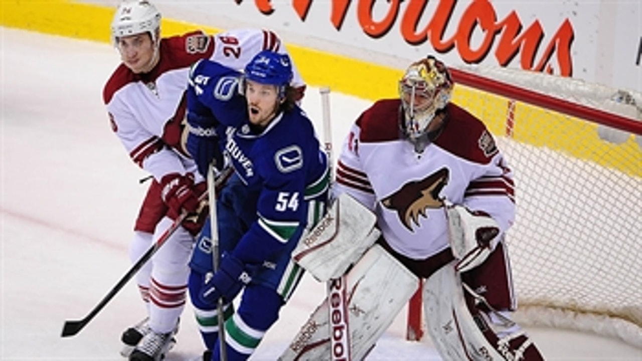 Coyotes dropped by Canucks in OT