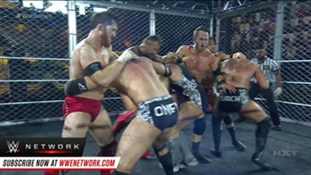 Pat McAfee soars off the cage and takes out the field: NXT TakeOver: WarGames (WWE Network Exclusive)