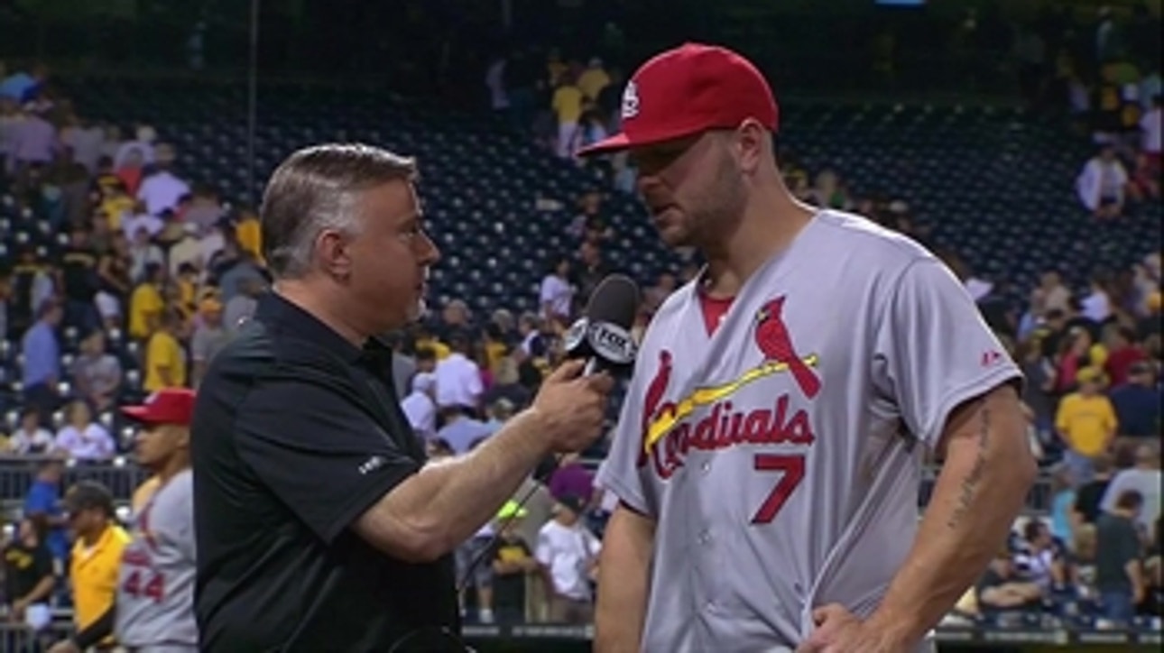 Holliday leads Cardinals past Pirates