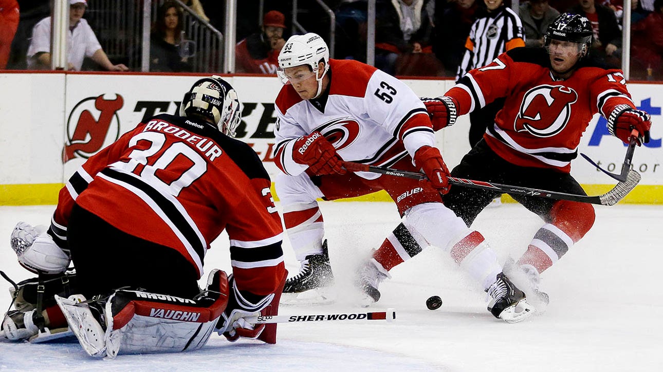Hurricanes hold off Devils