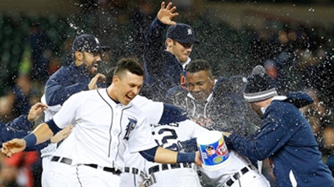 Kinsler leads Tigers to win in extras
