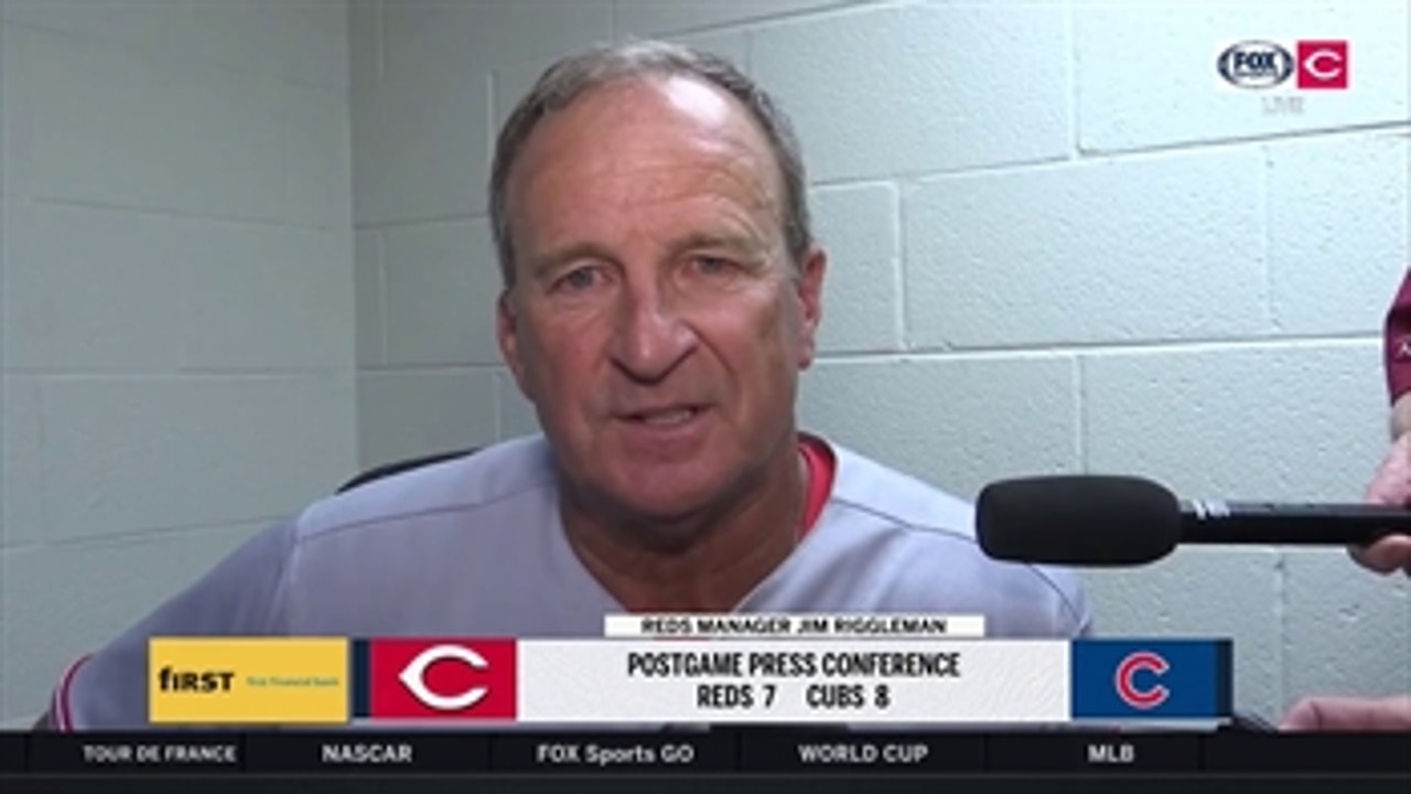 Reds skipper Jim Riggleman tips cap to Chicago, his ball club for great game