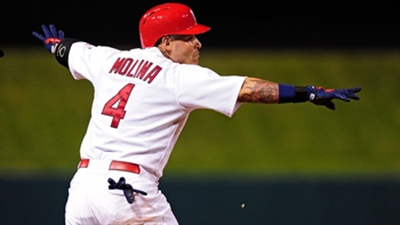 Yadi does it all, including a triple and a stolen base