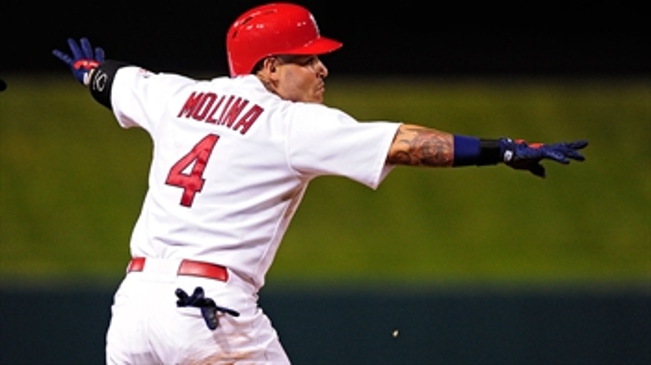 Yadi does it all, including a triple and a stolen base
