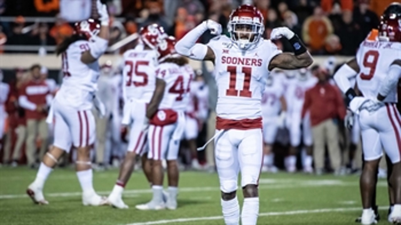 No. 7 Oklahoma breezes past No. 21 Oklahoma State to keep CFP dream alive