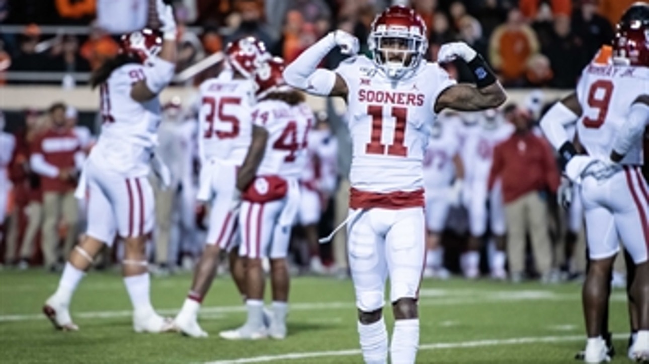 No. 7 Oklahoma breezes past No. 21 Oklahoma State to keep CFP dream alive