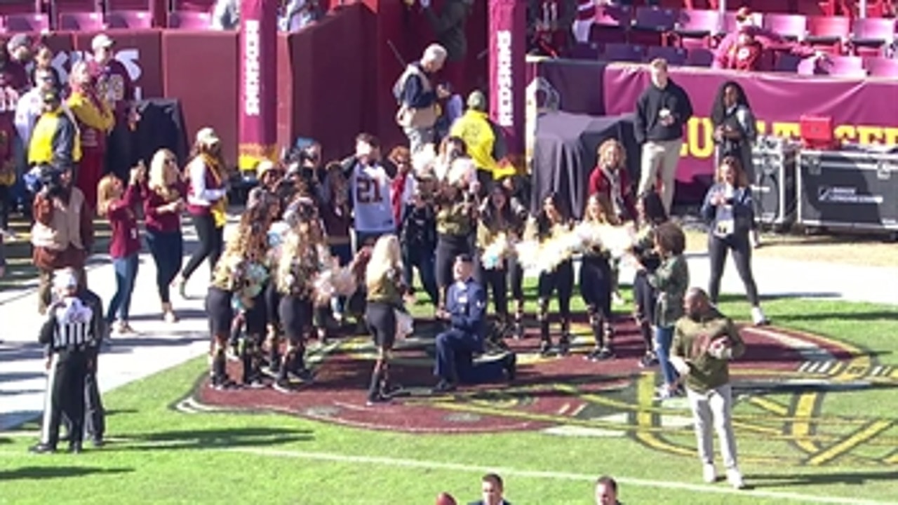 Watch a military member's surprise marriage proposal to his Redskins cheerleader girlfriend