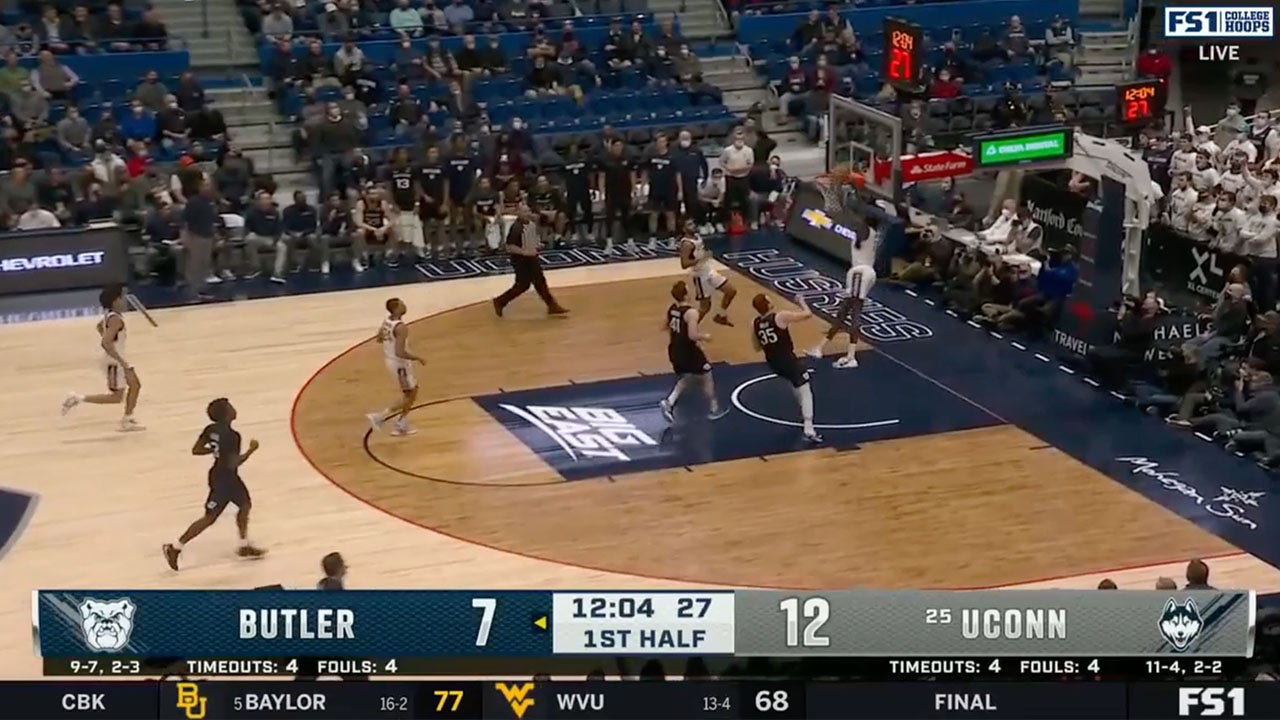UConn&#8217;s Akok Akok throws down the two-handed alley-oop jam