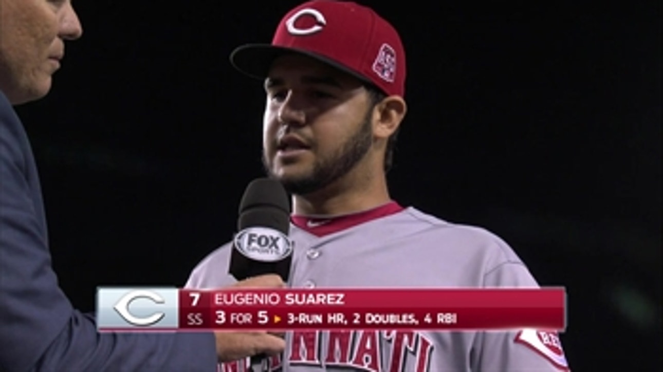 Suarez leads Reds over Dodgers