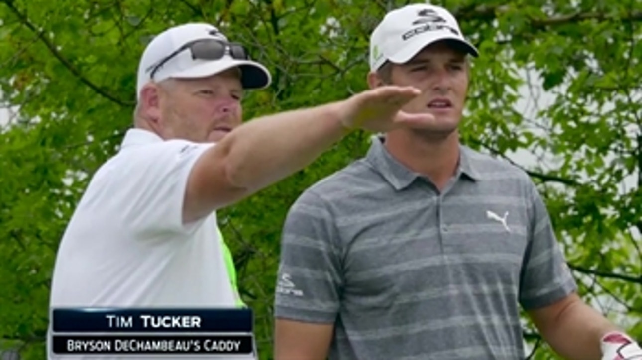 Bryson DeChambeau works through a shot with his caddie ' 2017 U.S. Open