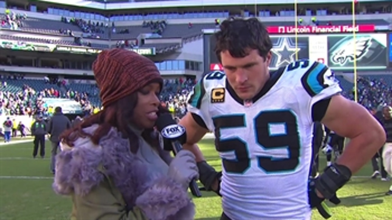 Luke Kuechly talks to Pam Oliver after the Panthers' incredible comeback win against the Eagles