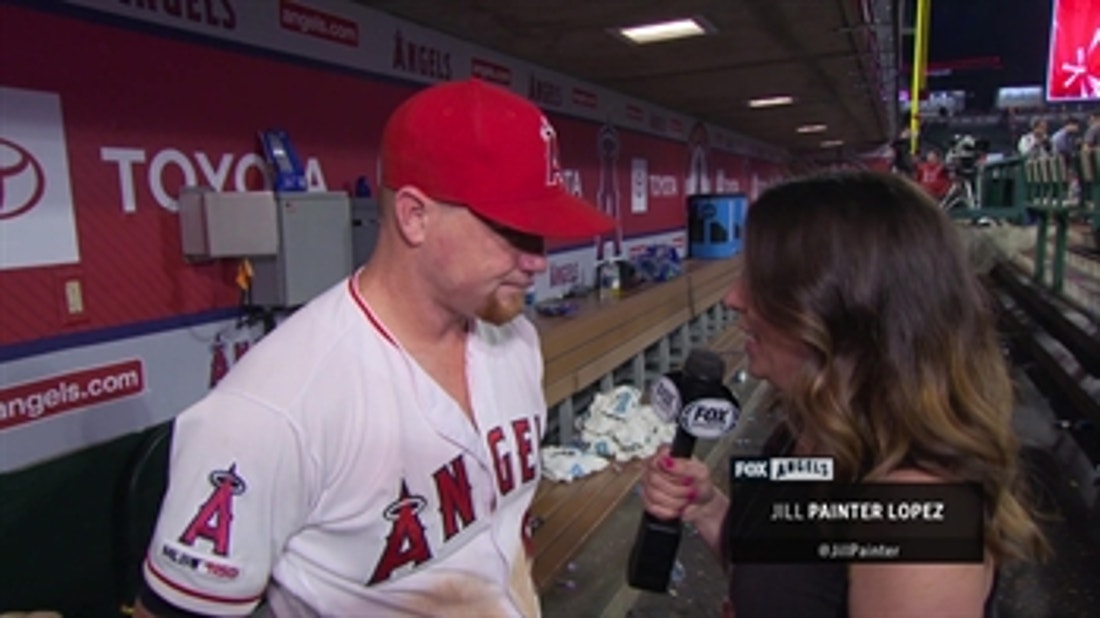 Texas Rangers right fielder Kole Calhoun (56) watches fans