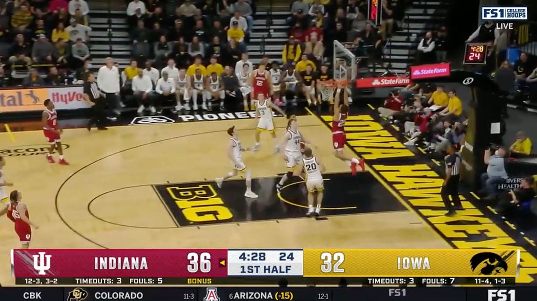 Indiana's Race Thompson throws down a vicious alley-oop dunk, increasing Indiana's lead