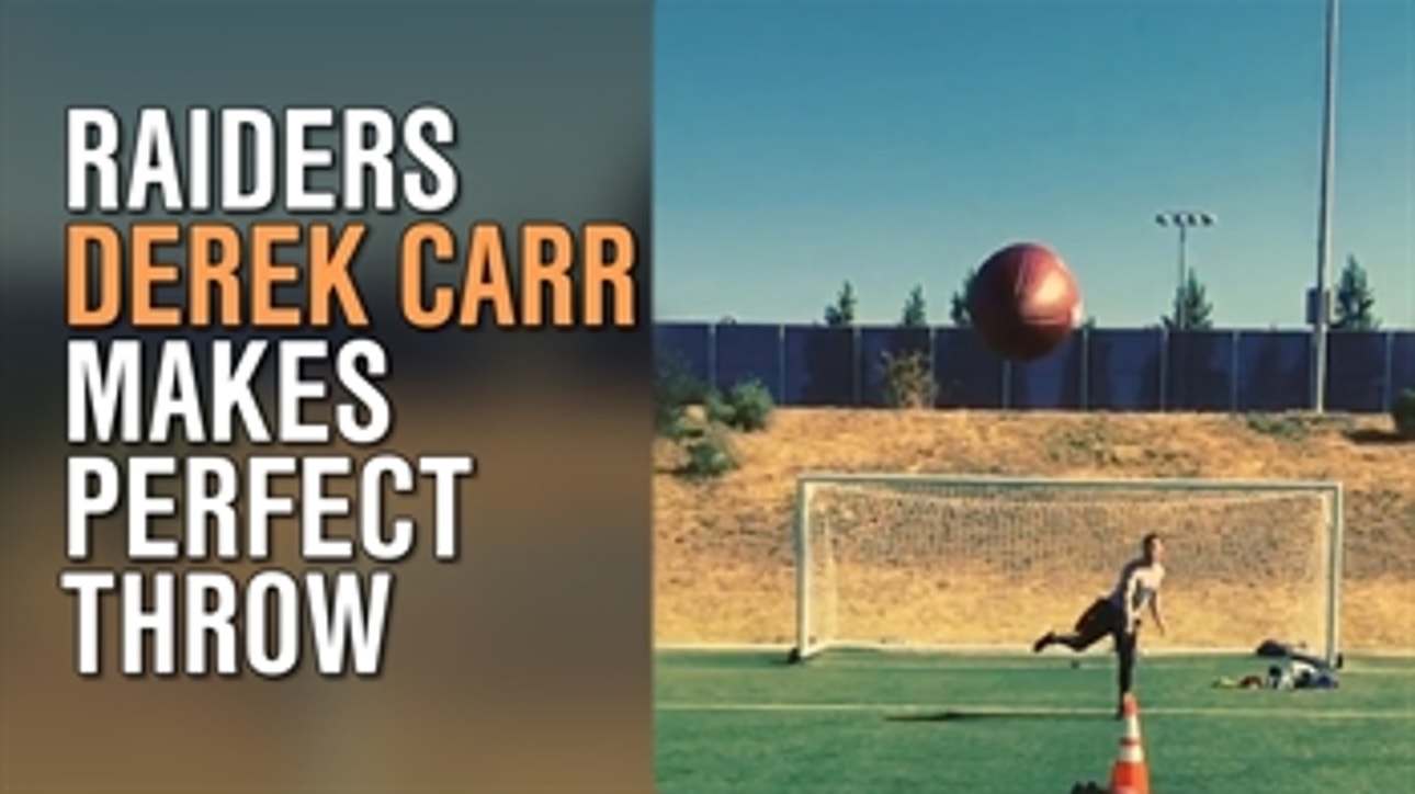 Oakland Raiders quarterback Derek Carr shows off his arm