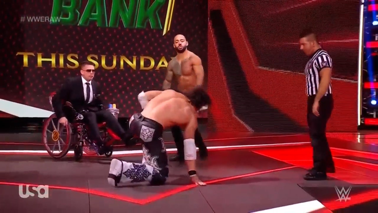 Ricochet and John Morrison destroy a ladder in Falls Count Anywhere Match