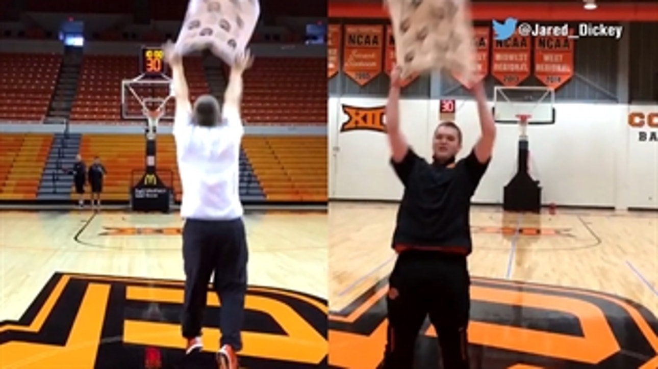 OSU manager hits another half-court shot with towel … but this time he did it backwards
