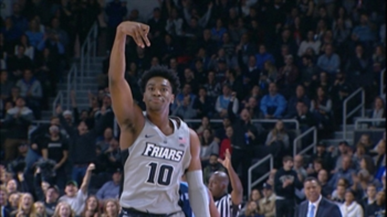 Providence holds on to defeat Rhode Island 59-50
