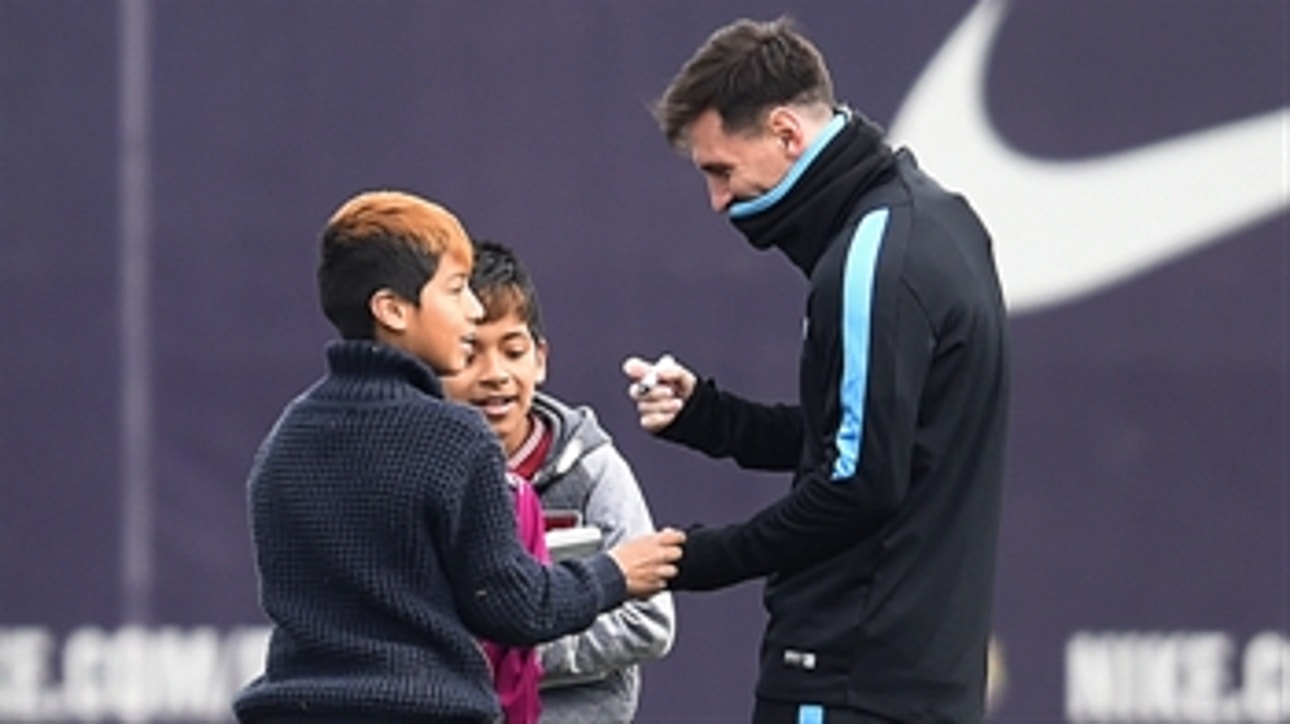 Lionel Messi welcomes kids who crashed Barcelona training
