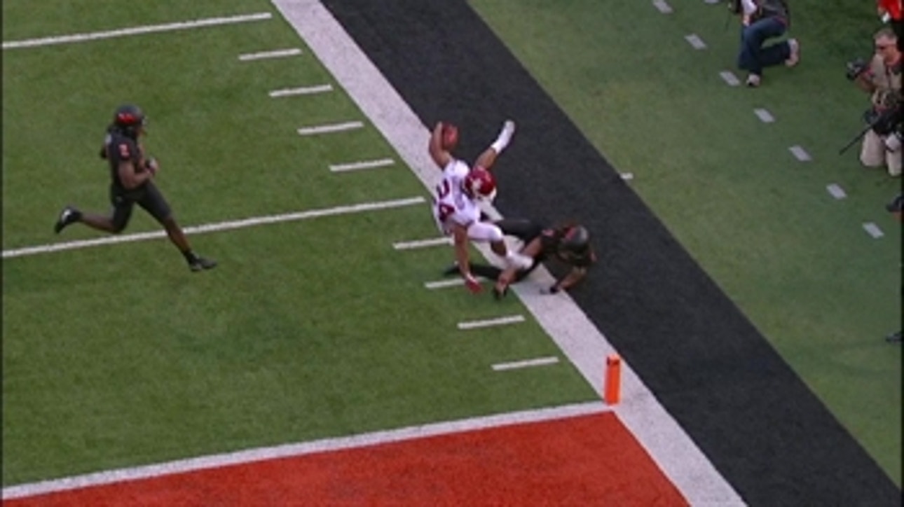 Baker Mayfield eludes the rush and finds Rodney Anderson for a 43-yard TD giving Oklahoma a 48-38 lead