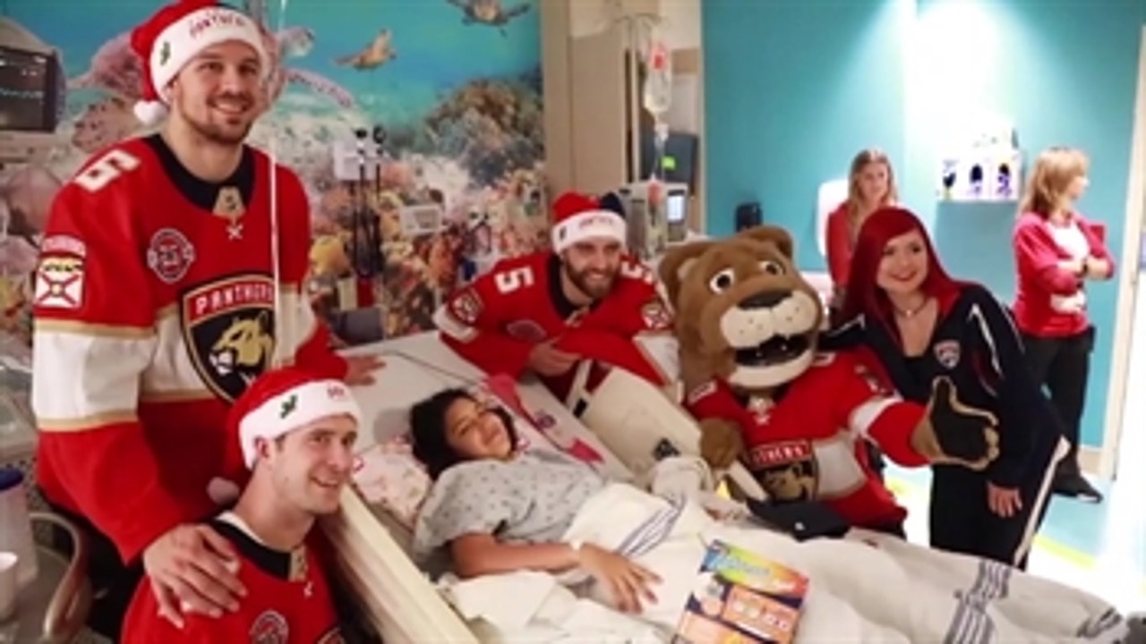 Panthers players spread holiday cheer with visits to local hospitals