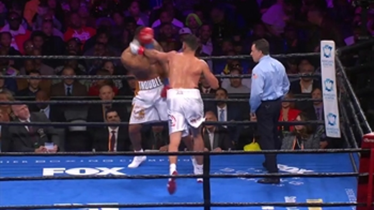 Dominic Breazeale and Carlos Negron throw punches after the bell ' PBC on FOX