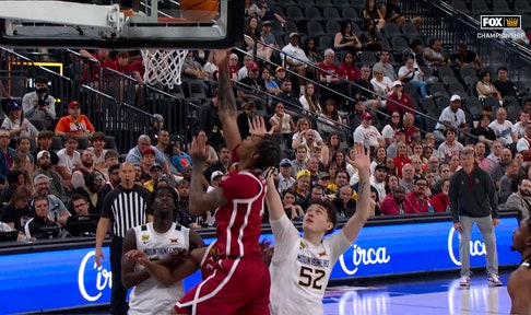 Xzayvier Brown finds Tae Davis off baseline cut for an and-one, extending Oklahoma's lead over West Virginia