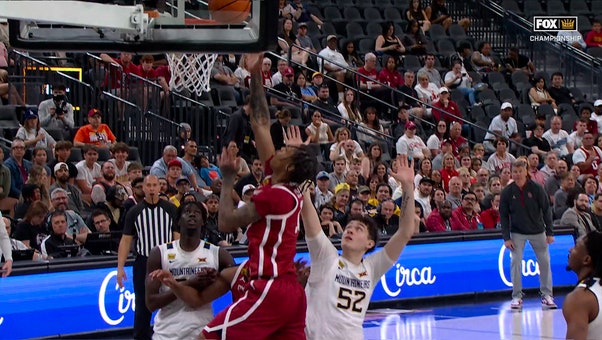 Xzayvier Brown finds Tae Davis off baseline cut for an and-one, extending Oklahoma's lead over West Virginia